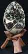 Septarian Dragon Egg Geode With Calcite Crystals #33496-1